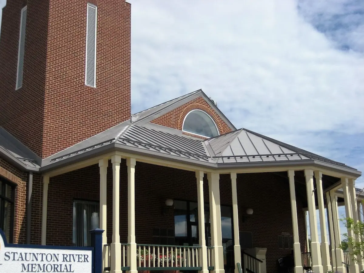 Skilled roofing craftsmen working on a residential roof in Bruce